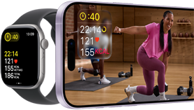 Apple Watch Series 11, caja de aluminio color negro azabache, métricas de entrenamiento, correa deportiva color niebla lila, se está reproduciendo un entreno en vídeo en un iPhone enlazado